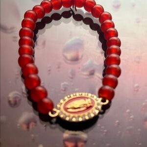 Elegant Red Beaded Bracelet with Gold Accents